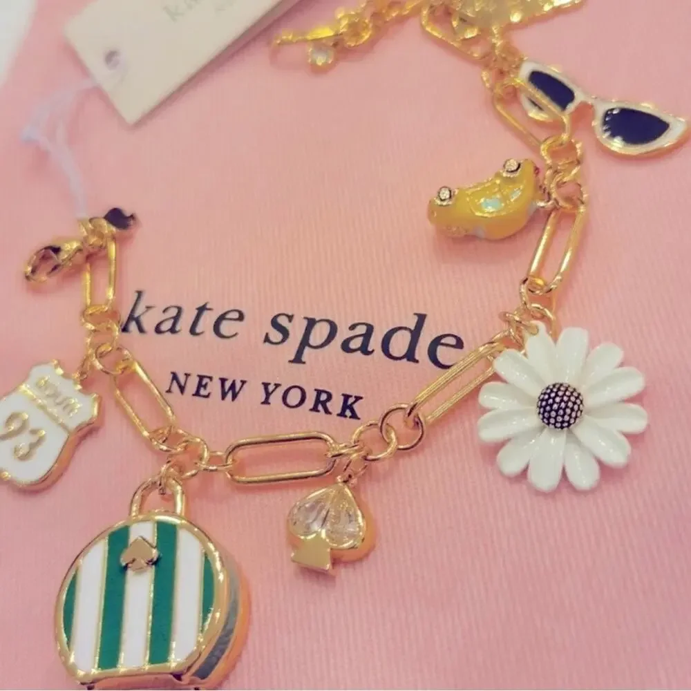 Kate Spade Gold off we go travel charm bracelet NWT -Dust Bag Included